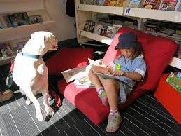 Image for event: Book Buddies reading dogs
